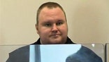 An associate of Megaupload founder Kim Dotcom was released from custody on bail in New Zealand on Thursday, as the NZ $. million (US $. million) home of his former boss was seized.